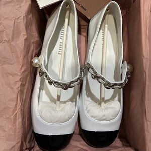 Miu Miu White Flats with Silver Chain Accent